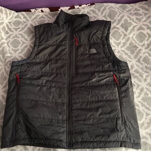 The North Face Black Puffer Vest with Red Zipper